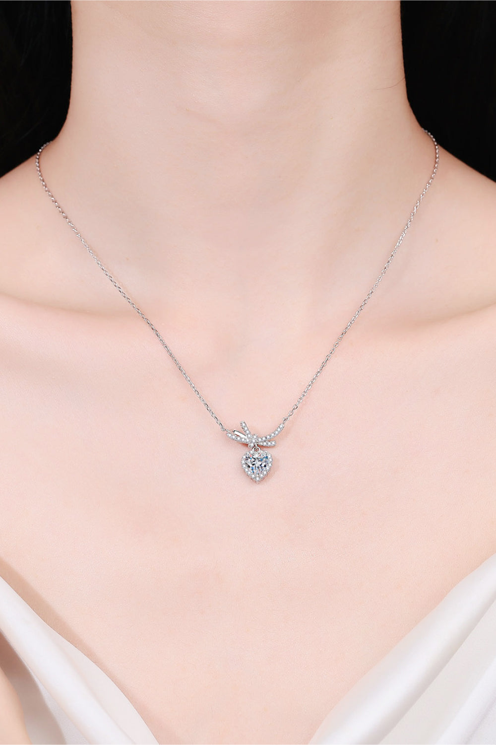 1 Ct Moissanite Heart & Bow Pendant Necklace - Rhodium Vermeil- Claude Jewelry Moissanite - Shop claudejewelry.com