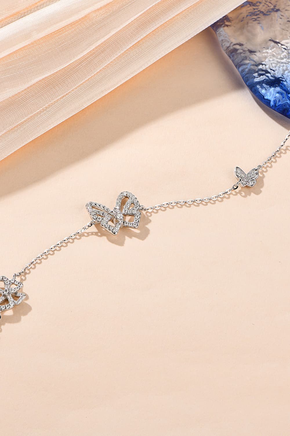 Moissanite Three Butterfly Charm Bracelet - Platinum Vermeil- Claude Jewelry Moissanite - Shop claudejewelry.com