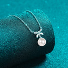 Natural Pearl Bow Pendant Moissanite Necklace - 925 Sterling Silver- Claude Jewelry Moissanite - Shop claudejewelry.com